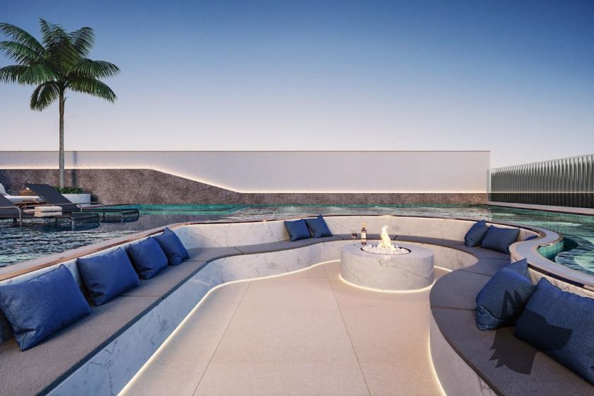 Fireplace em ilha dentro da piscina do Luminare Residencial Rausch