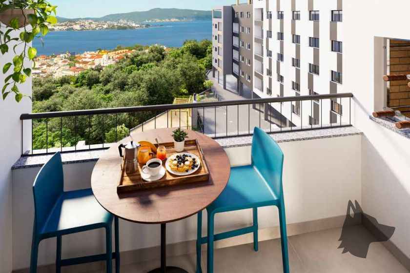 Varanda com churrasqueira do Scire View